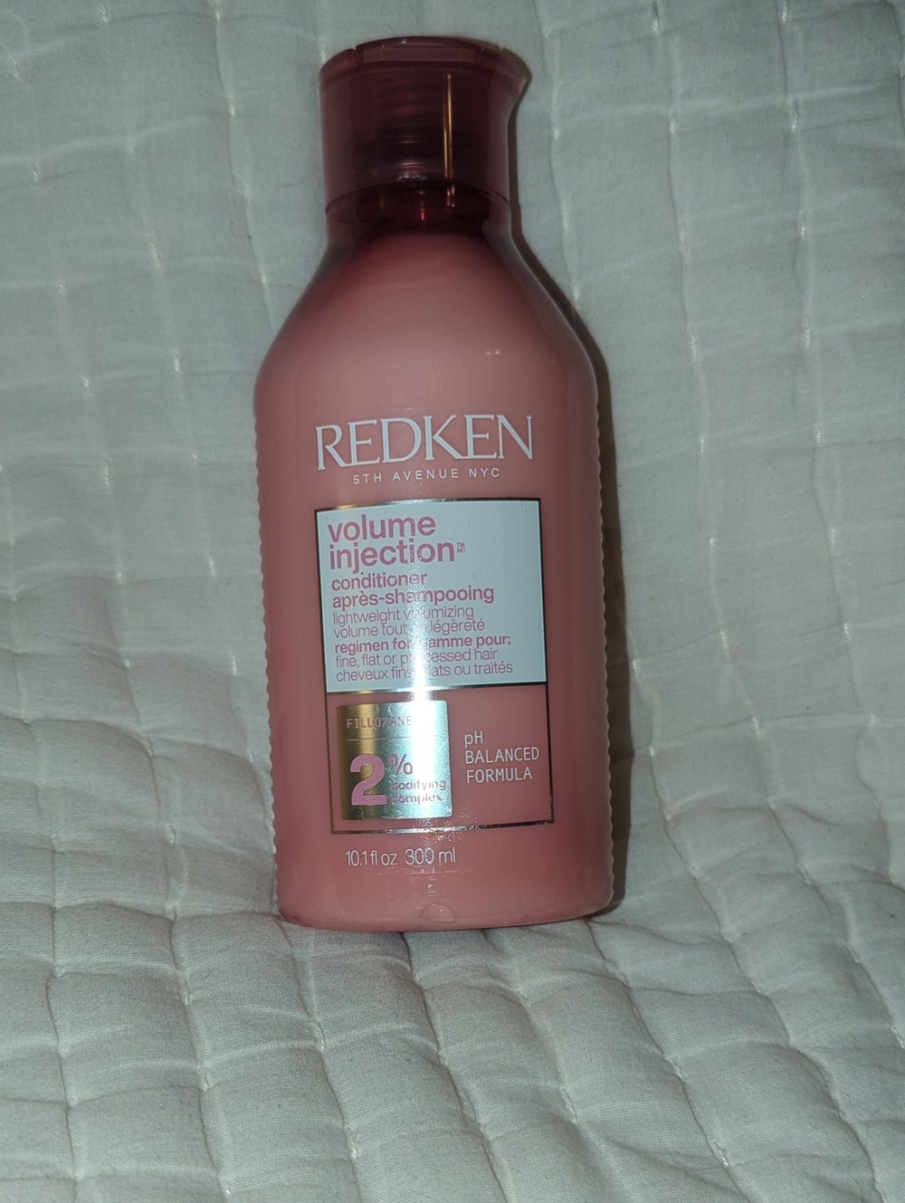 Redken Pink Volume Injection Conditioner Bottle